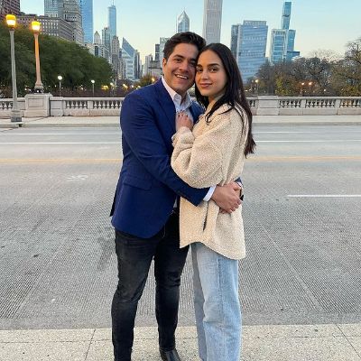 Xavier Zazueta and Melissa Barrera are posing together for a picture.